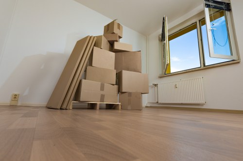 Student removals team handling boxes in a Kingston residential street