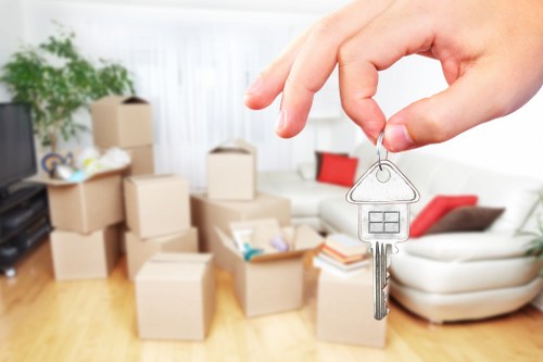 Packed boxes and furniture prepared for a Kingston home move