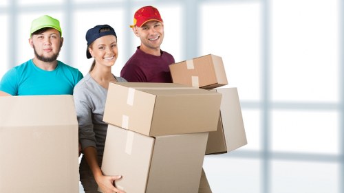 Moving crew assessing hazards before loading items
