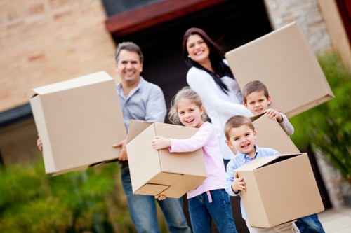 Packing boxes and recycled materials arranged for a greener Movers Kingston relocation