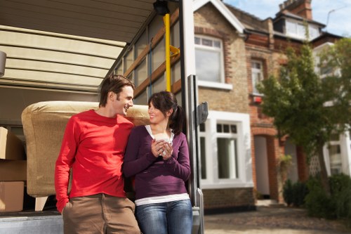 Specialist piano moving team navigating Kingston property access and parking